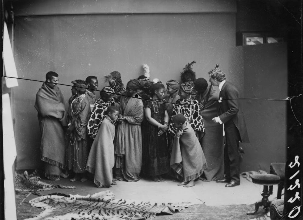 Members of The African Choir pose for a group portrait with their English musical director James Balmer (far right), 1891.