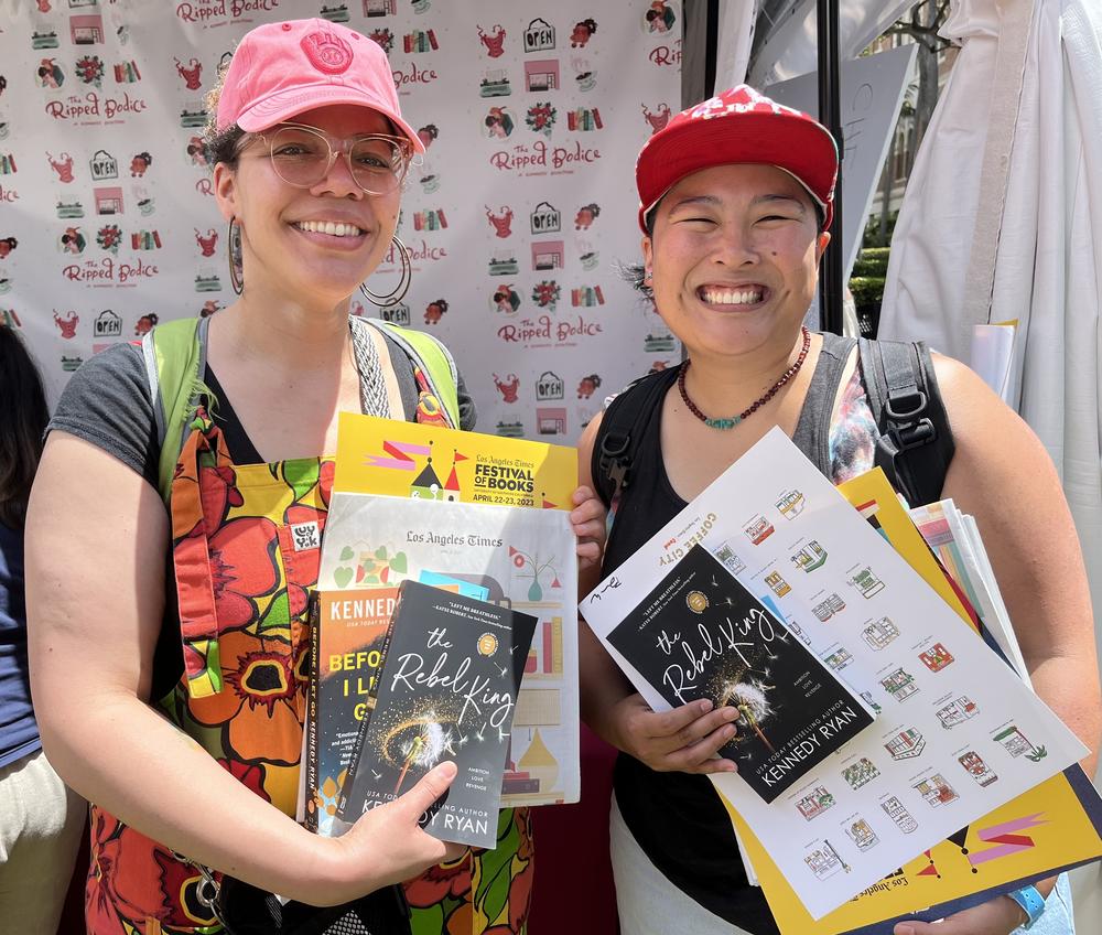 Tiffiny Hargrave and Himeko de Guzman wait in line to meet Kennedy Ryan at the 2023 Los Angeles Times Festival of Books.