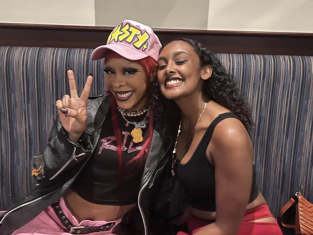 Rico Nasty (left) and fan Talille Jaro back stage before a performance at the Moda Center in Portland, Ore. in September 2022.