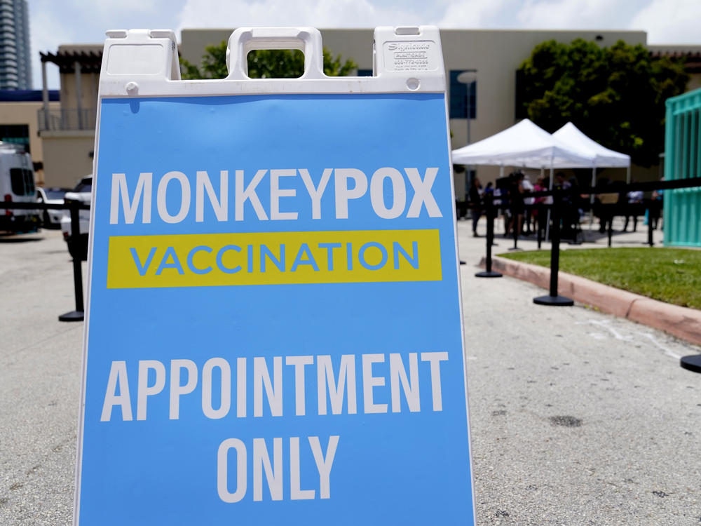 A sign for monkeypox vaccinations is shown at a vaccination site in Miami Beach, Fla.