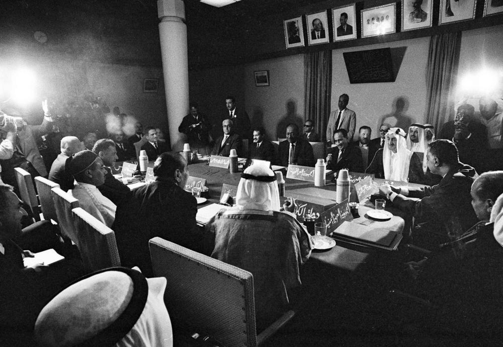 Heads of Arab states are seated around the table at a summit meeting in Khartoum, Sudan, Aug. 30, 1967.