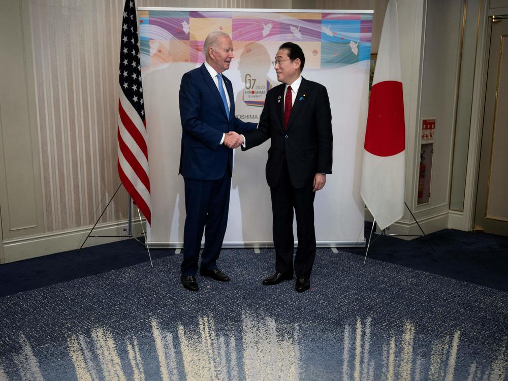 President Biden greets Japan's Prime Minister Fumio Kishida before a bilateral meeting in Hiroshima ahead of the G-7 leaders' summit.