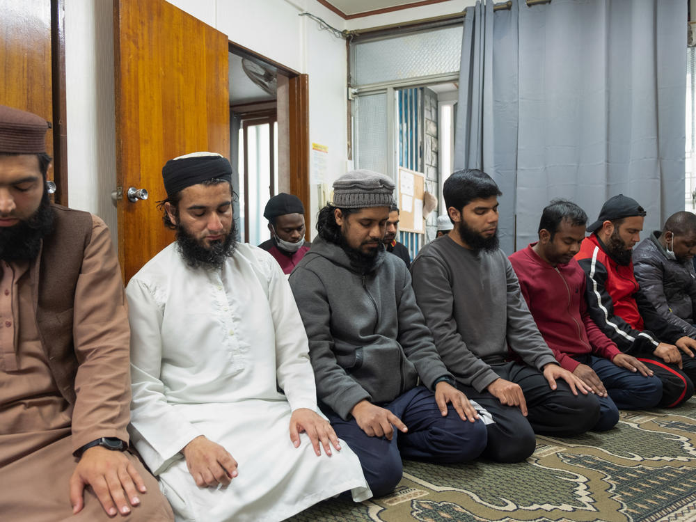 The Muslim community at Kyungpook National University mostly comprises students from Pakistan, Nigeria, Bangladesh and other countries with large Muslim populations. Here some members of the community pray at the Dar ul Emaan Kyungpook Islamic Center, in Daegu, South Korea.