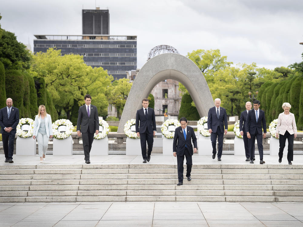 European Council President Charles Michel (from left), Italian Prime Minister Giorgia Meloni, Prime Minister Justin Trudeau, President Emmanuel Macron, Japan's Prime Minister Fumio Kishida, President Biden, German Chancellor Olaf Scholz, British Prime Minister Rishi Sunak and European Commission President Ursula von der Leyen at a monument for atomic bomb victims in Hiroshima, Japan, Friday.