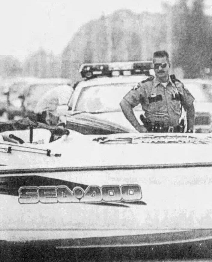 Steven Calkins is seen in 1999, at the scene where a boat fell off a trailer and blocked traffic.