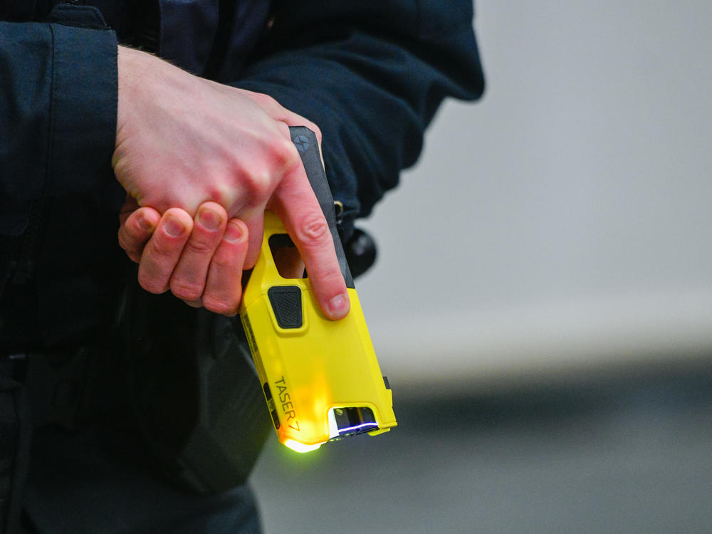 An Australian nursing home resident is in critical condition after being stunned by a Taser and collapsing to the floor.