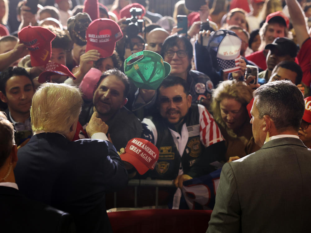 Former President Donald Trump greets supporters at a campaign rally on April 27, 2023 in Manchester, N.H.