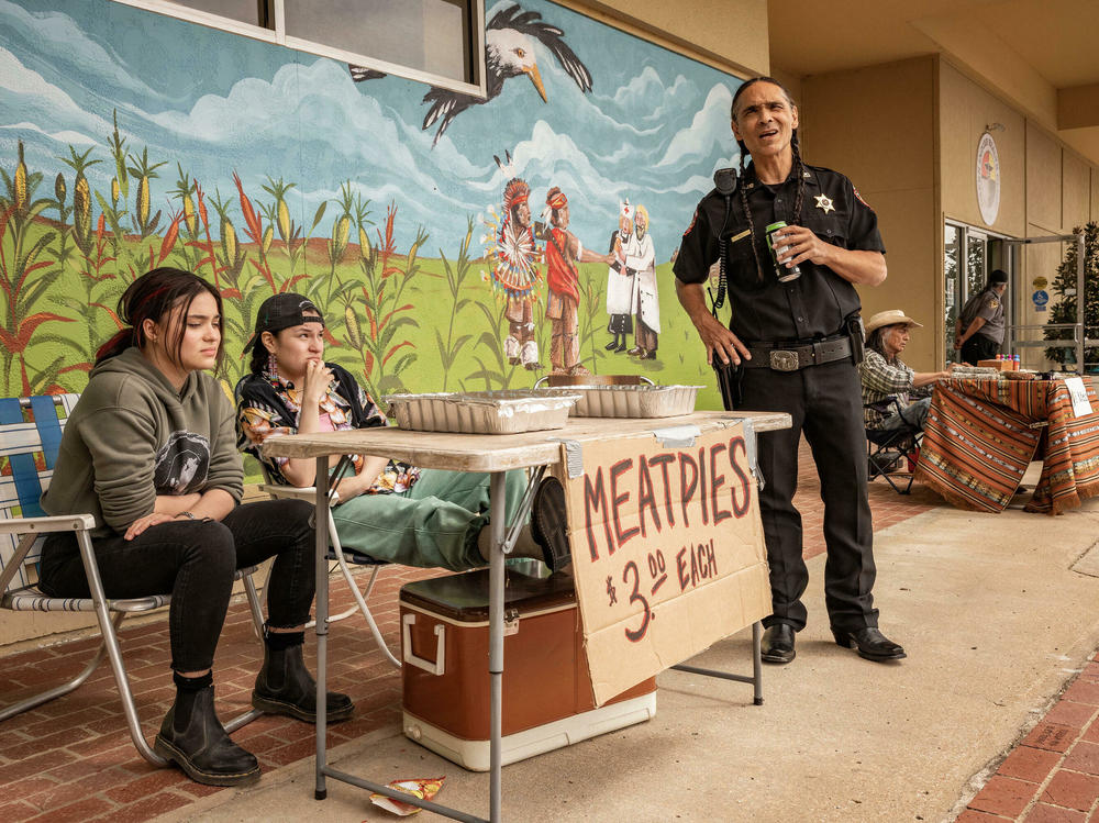 Devery Jacobs as Elora, Paulina Alexis as Willie, and Zahn McClarnon as Big in <em>Reservation Dogs</em>