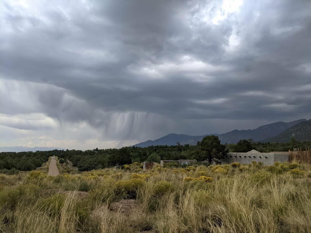 A rainstorm hits the Sangre de Cristo mountains. The range's snowmelt and rainfall replenish aquifers in Colorado's San Luis Valley. But the area gets just 7 inches of rain in an average year.