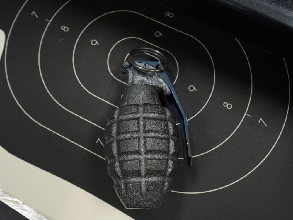 A grenade is on display at Jimmy's Sport Shop in Mineola, New York on September 25, 2020.