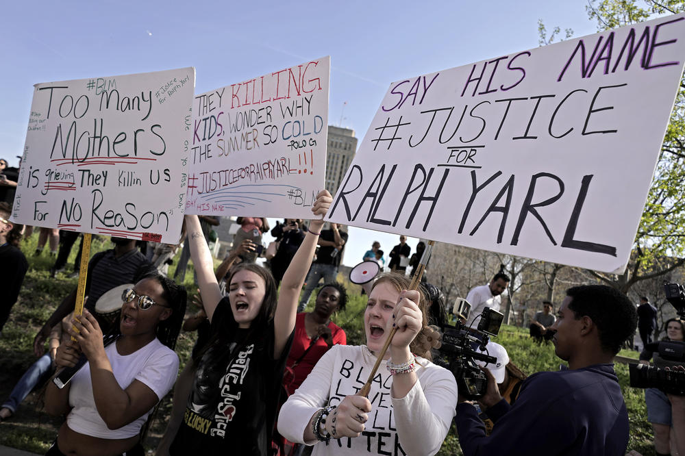 People gather at a rally to support Ralph Yarl, on April 18, in Kansas City, Mo. Yarl, a Black teenager, was shot by a white homeowner when he mistakenly went to the wrong address to pick up his younger brothers.