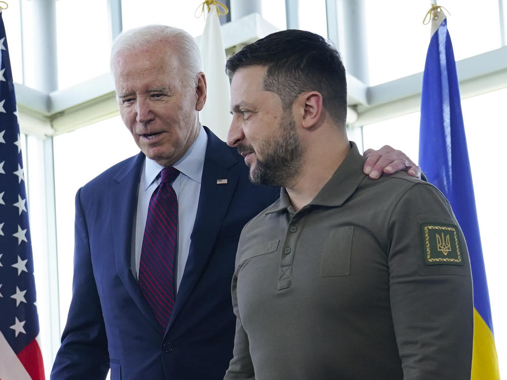 President Biden walks with Ukrainian President Volodymyr Zelenskyy ahead of a working session on Ukraine during the Group of Seven summit in Hiroshima, Japan, Sunday. In a win for the Ukrainian leader, Biden supported training Ukraine's pilots to fly F-16s.