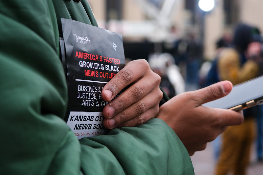 Sorrell distributes Kansas City Defender fliers at the #justiceforkck rally at the Unified Government of Wyandotte County & Kansas City, Kan., on Nov. 17, 2022.
