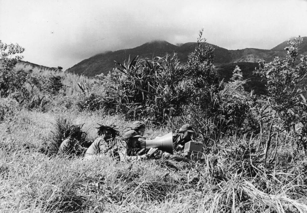 Hidden in the undergrowth, Nationalists on Kinmen Island transmit news and slogans to the Communist Chinese coast, circa 1954.