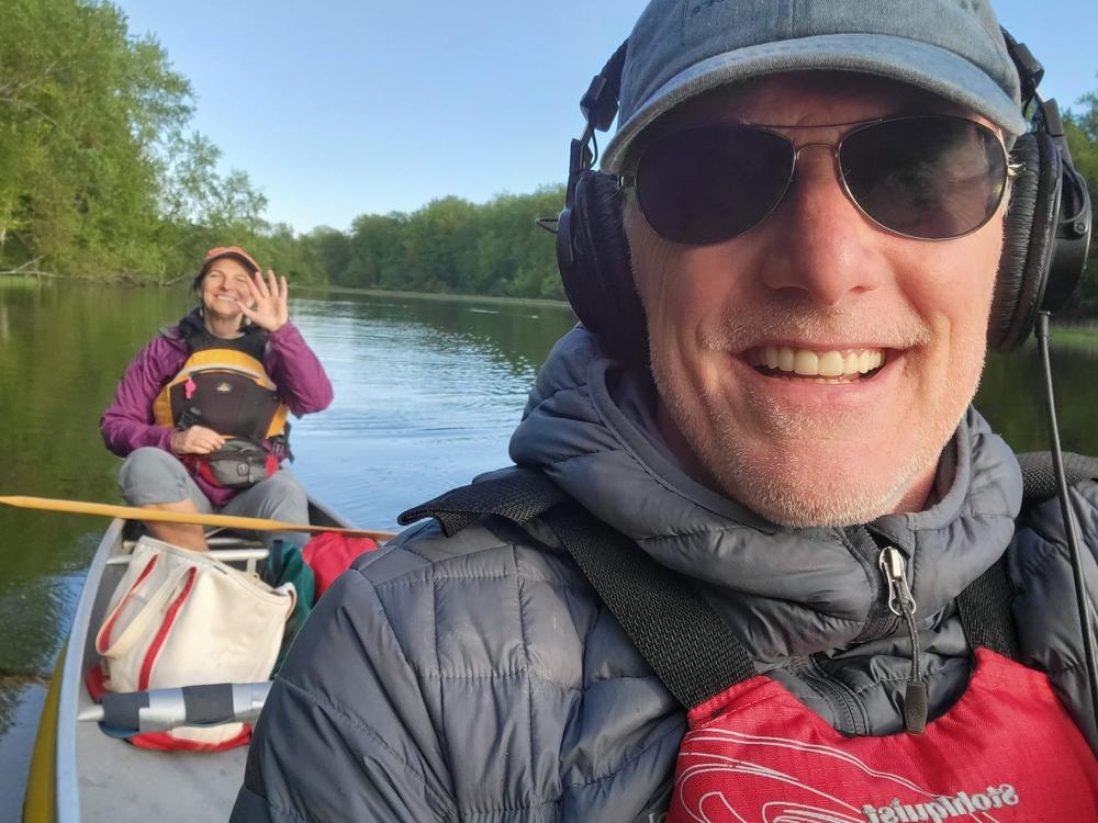 Catherine Seidenberg, a Vermont native, guides her canoe along the Missisquoi River as NPR's Brian Mann records bird sounds in the bow.