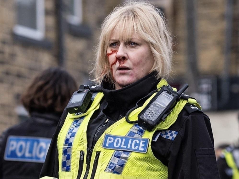 Sarah Lancashire plays big-hearted police sergeant Catherine Cawood in <em>Happy Valley.</em>