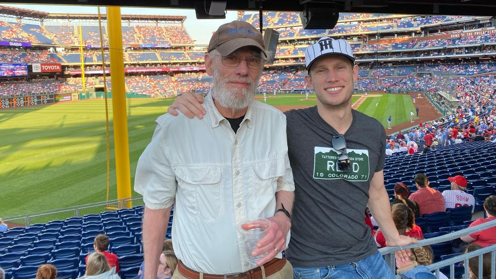 Josh with his dad at a Philadelphia Phillies game in 2022.