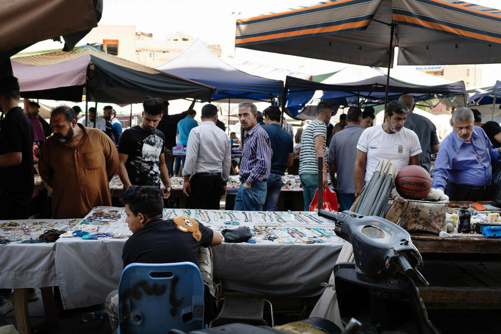 Vendors sell various goods to shoppers at 