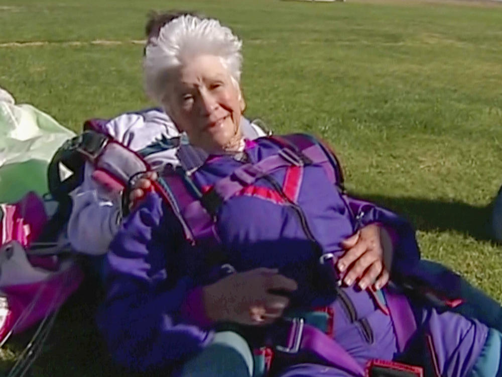 In this image made from video, Clare Nowland reacts following her skydive in Canberra, Australia April 6, 2008.