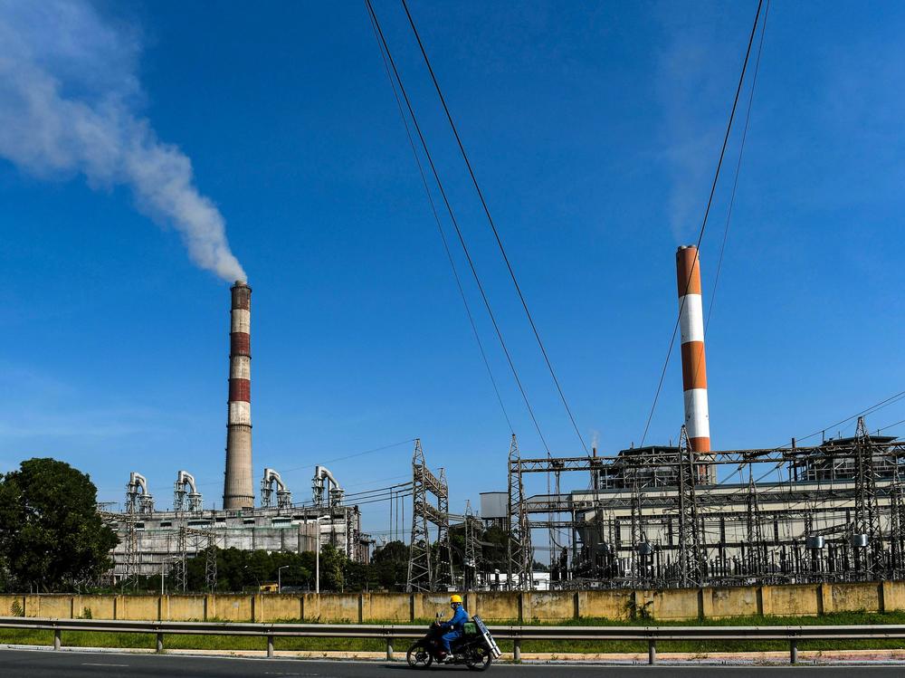 Wealthy countries and investors are planning to give Vietnam billions of dollars to help it transition from coal to renewable energy. But the climate deal has come under fire because of Vietnam's record on human rights.