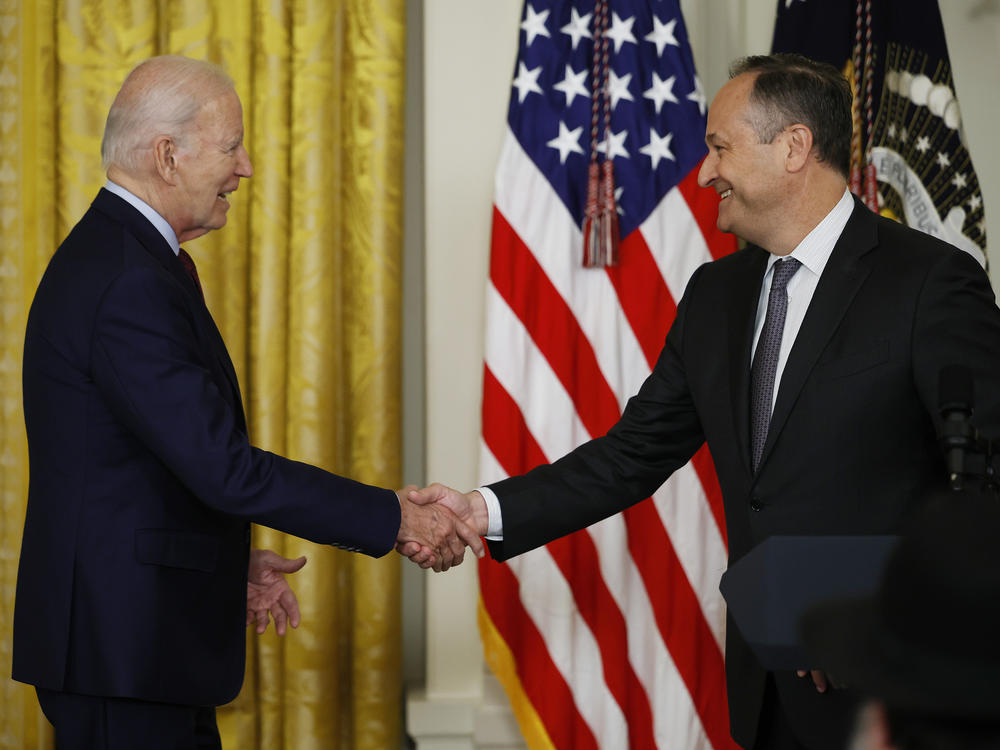 President Joe Biden shakes hands with second gentleman Doug Emhoff during a celebration marking Jewish American Heritage Month last week. The administration has just released a comprehensive strategy for combating antisemitism.