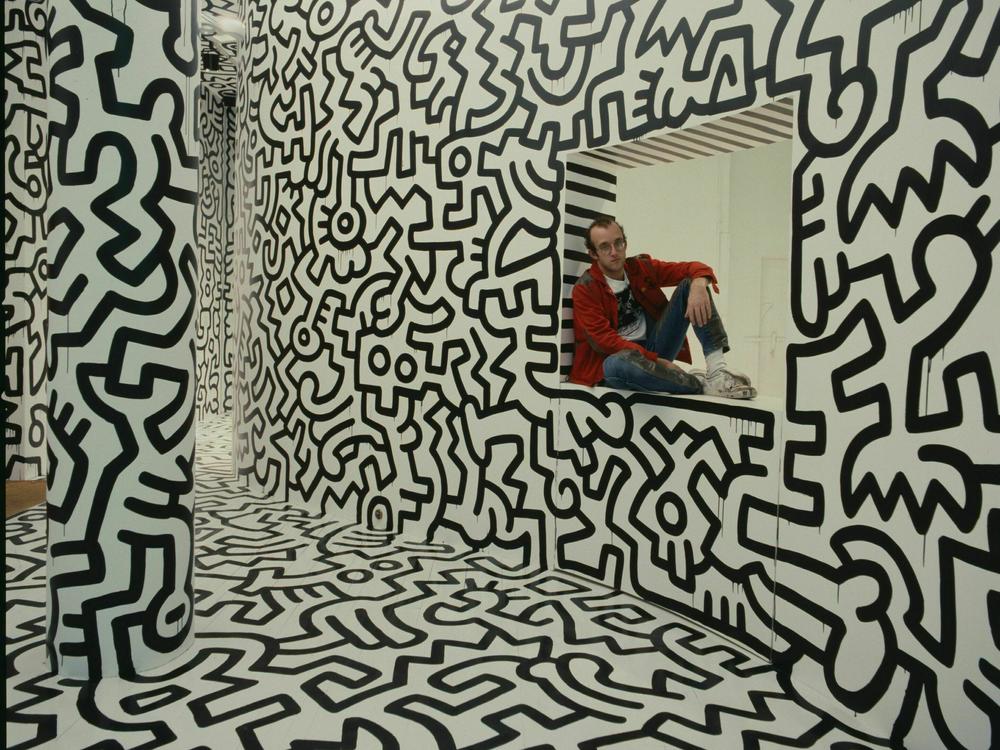 Keith Haring at his Pop Shop in SoHo, 1986