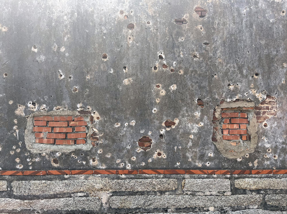 This wall on Taiwan's Kinmen island still bears bullet holes from the 1949 Battle of Guningtou between Nationalist and Communist forces.