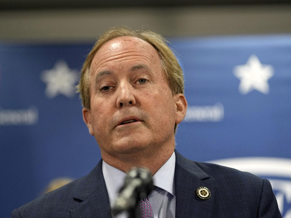 Texas state Attorney General Ken Paxton reads a statement at his office in Austin, Texas, Friday, May 26, 2023. An investigating committee says the Texas House of Representatives will vote Saturday on whether to impeach.