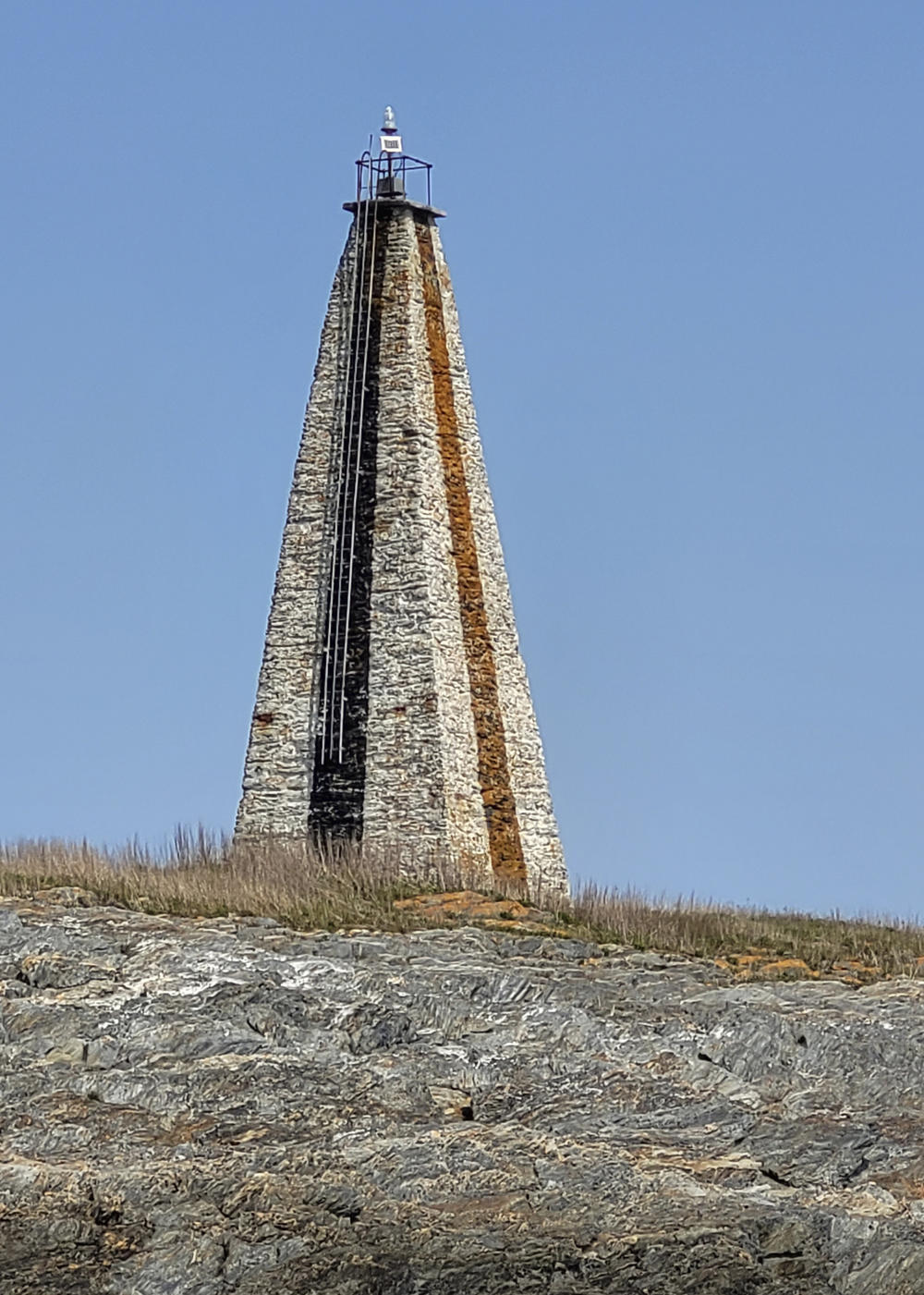 Little Mark Island and Monument stands between Broad Sound and Casco Bay, off the coast of Harpswell, Maine.