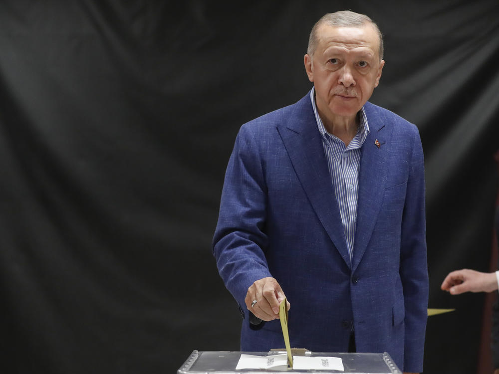 Turkish President Recep Tayyip Erdogan casts his ballot at a polling station during the second round of the presidential election in Istanbul, on Sunday.