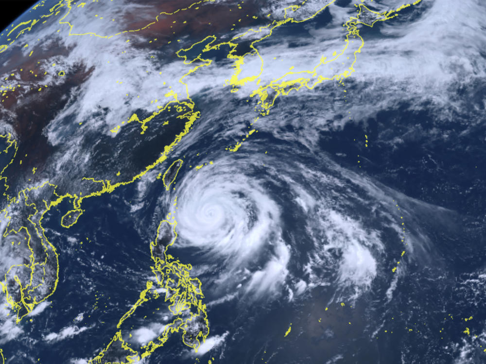 This satellite image released by National Institute of Information and Communications Technology shows Typhoon Mawar approaching Philippine northern provinces on Monday.