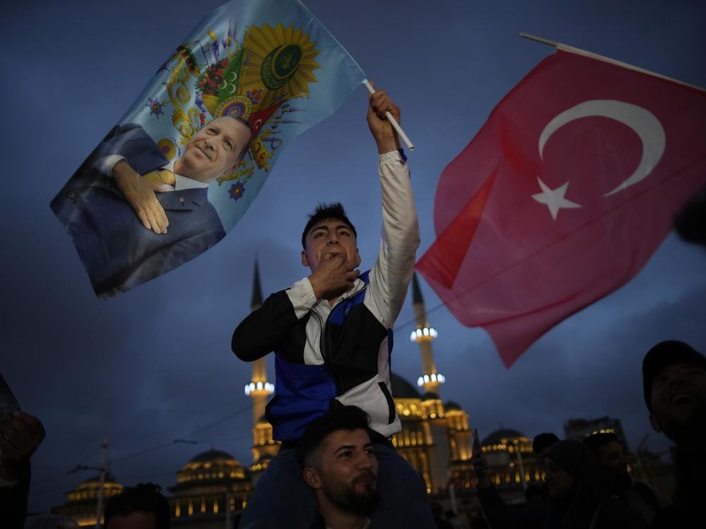 Supporters of the President Recep Tayyip Erdogan celebrate in Istanbul, Turkey, on Sunday.