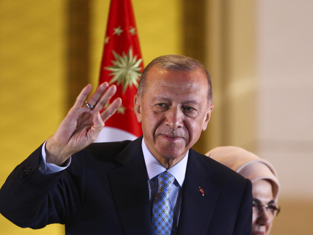 Recep Tayyip Erdogan makes a speech at the presidential palace, in Ankara, Turkey, on Sunday after securing five more years in office.