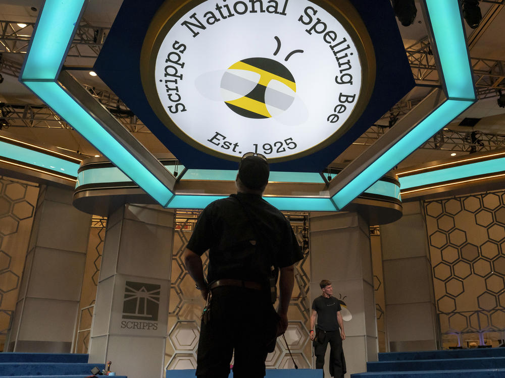 Crew members assemble the main stage ahead of the 2023 Scripps Nations Spelling Bee on Sunday, May 28, 2023, at National Harbor in Oxon Hill, Md.