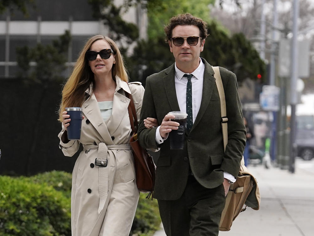 Danny Masterson and his wife Bijou Phillips arrive for closing arguments in his second rape trial on May 16, 2023, in Los Angeles.