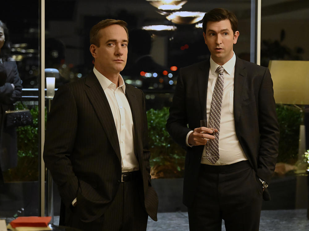 This image released by HBO shows Matthew Macfadyen as Tom Wambsgans, left, and Nicholas Braun as Greg Hirsch in a scene from the series 