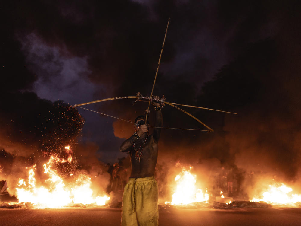 Guarani Indigenous people block the Bandeirantes highway with burning tires to protest proposed legislation that would change the policy that demarcates Indigenous lands on the outskirts of São Paulo, Brazil.