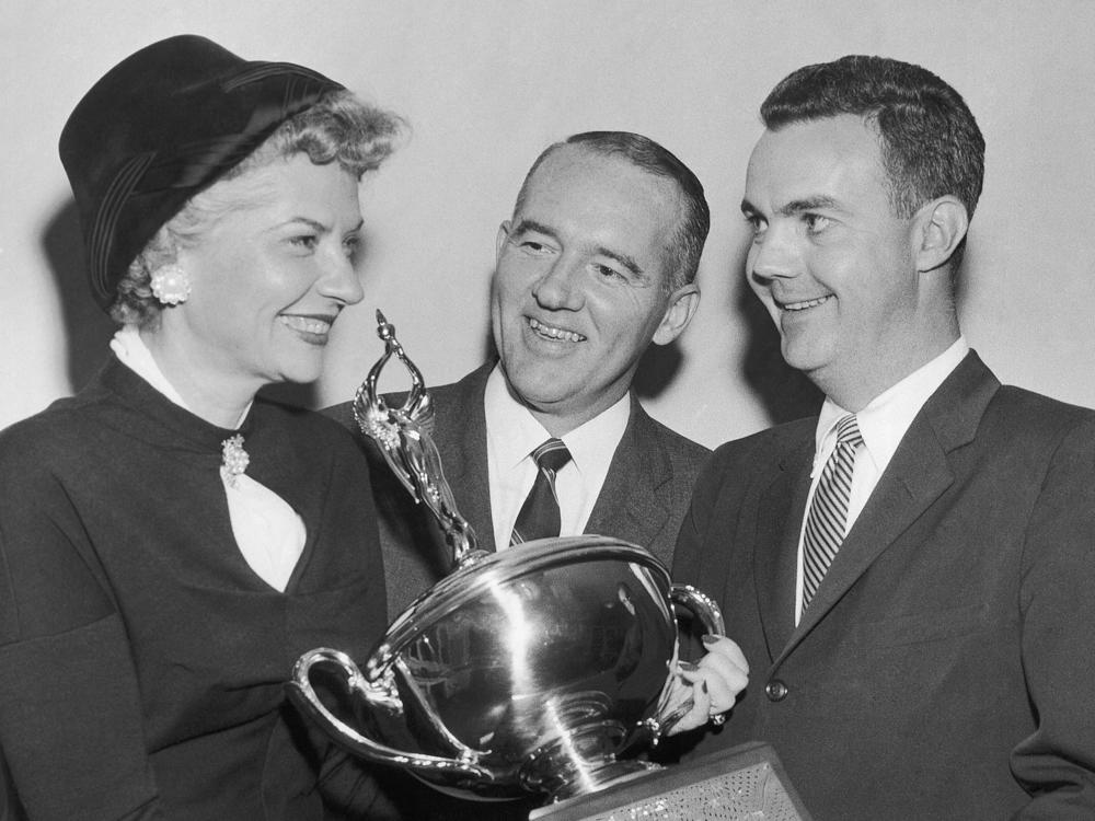 Brownie Wise, head of Tupperware Home Parties, receives a sales award in 1956.