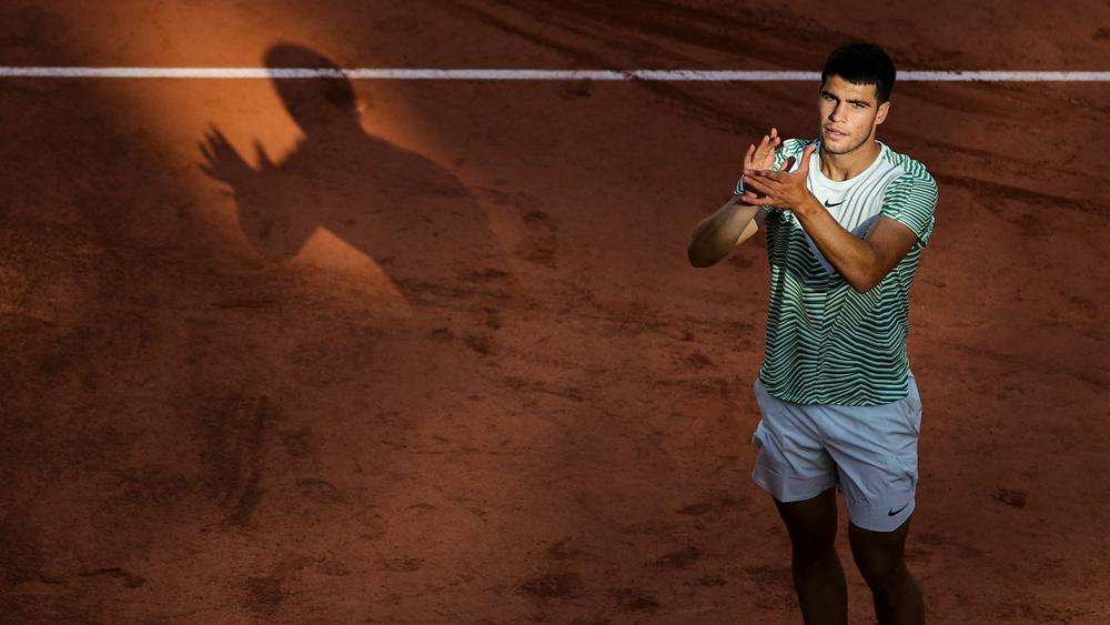 Spain's Carlos Alcaraz celebrates after winning his second round match at the French Open on Wednesday.