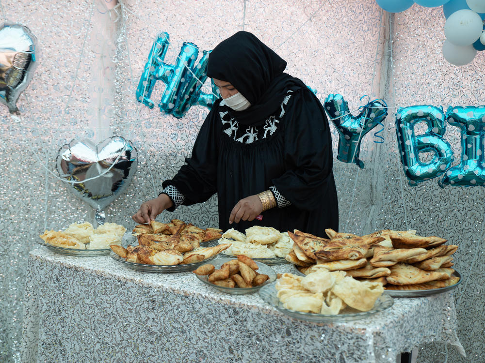 Samira Muhammadi, the owner of Banowan-e-Afghan restaurant, prepares food for a birthday party.