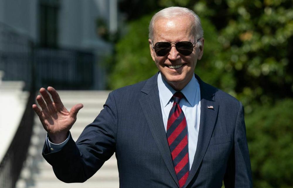 President Biden walks to board Marine One on the South Lawn of the White House on Wednesday ahead of the House vote on a bill that raises the debt ceiling and caps spending for two years.