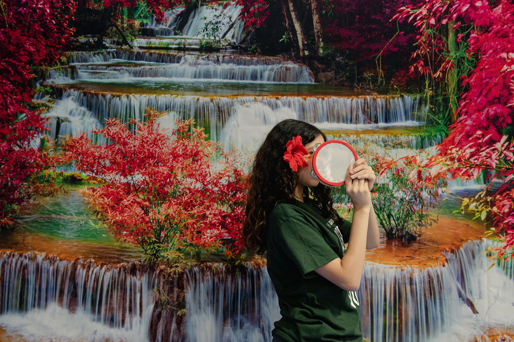 A Northern Virginia Juvenile Detention Center resident holds a tambourine after her final performance in Sound Impact's three-day residency.