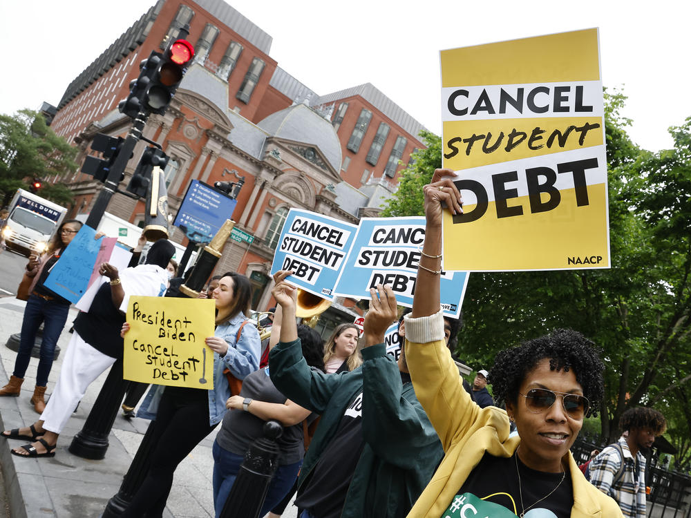Student loan borrowers gather near The White House in May 2020. On Thursday, the Senate voted to repeal President Biden's plan to offer up to $20,000 in federal student loan debt relief.