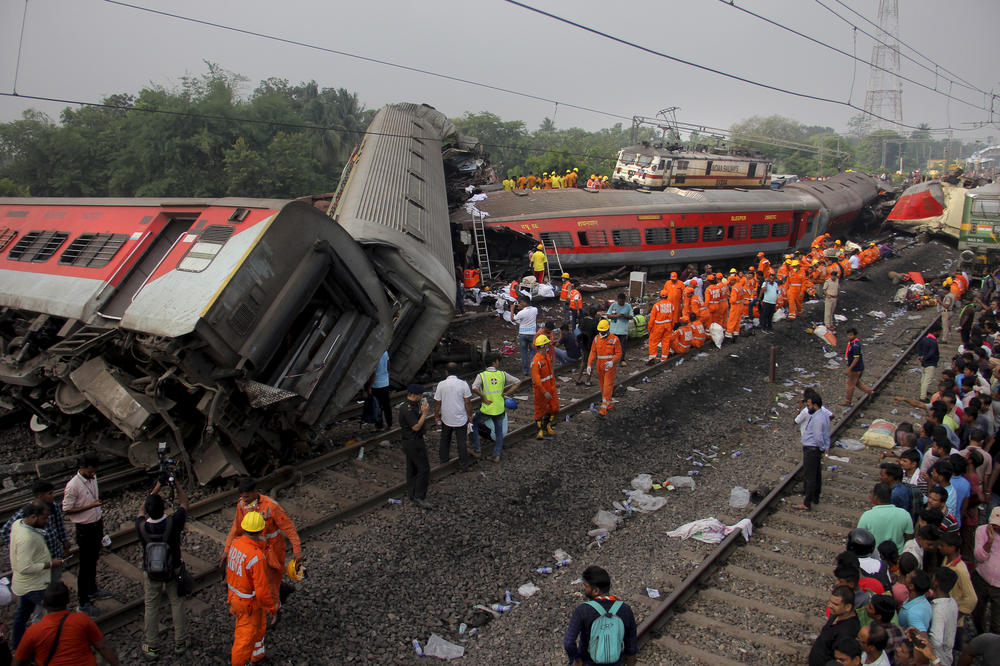 Rescuers work at the site of passenger trains accident, in Balasore district, in the eastern Indian state of Odisha, Saturday, June 3, 2023.