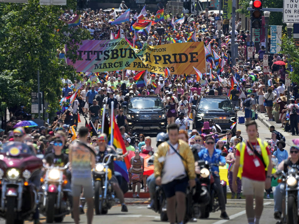 The Pittsburgh Pride parade, celebrating 50 years of Pittsburgh Pride, crosses the Andy Warhol Bridge from downtown Pittsburgh on June 3. Longtime Pride sponsors have come under attack by conservatives for their LGBTQ-friendly marketing.