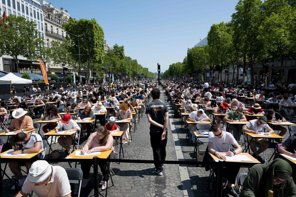 Organizers said the Paris event may have been the world's largest-ever dictation.