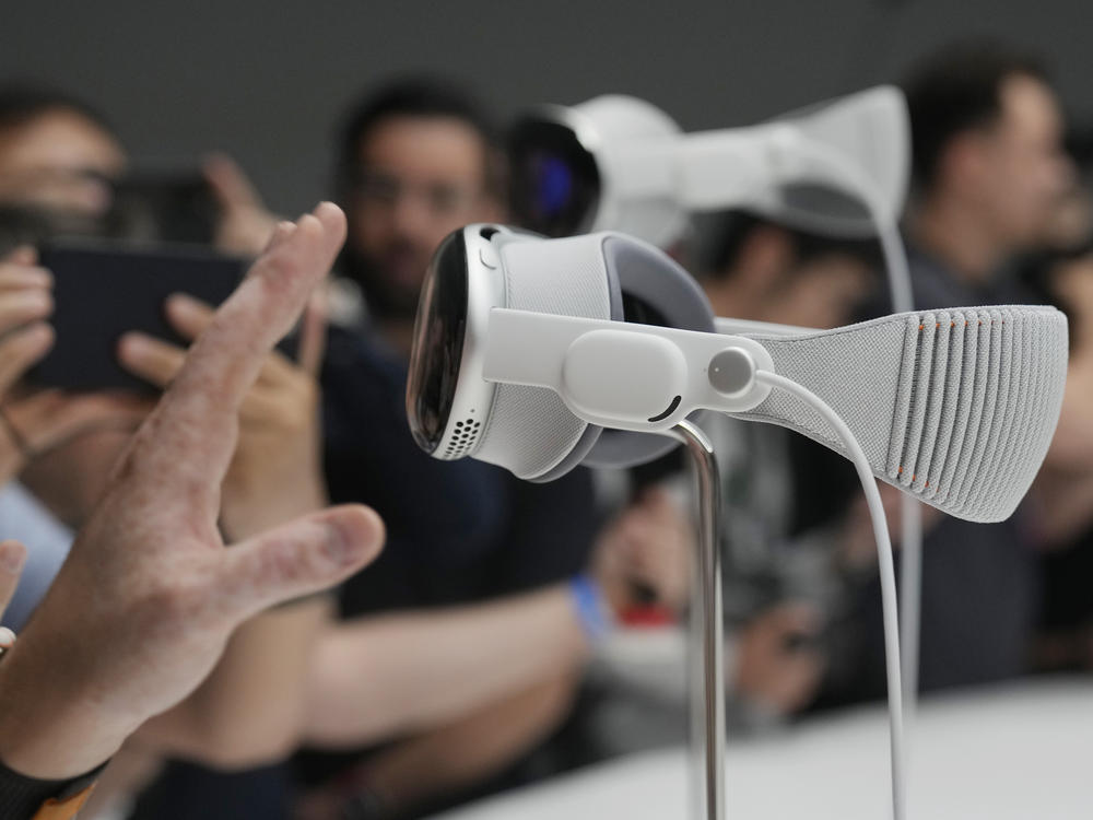 The Apple Vision Pro headset is displayed in a showroom on the Apple campus in Cupertino, Calif., at the company's annual developers conference, Monday, June 5, 2023.