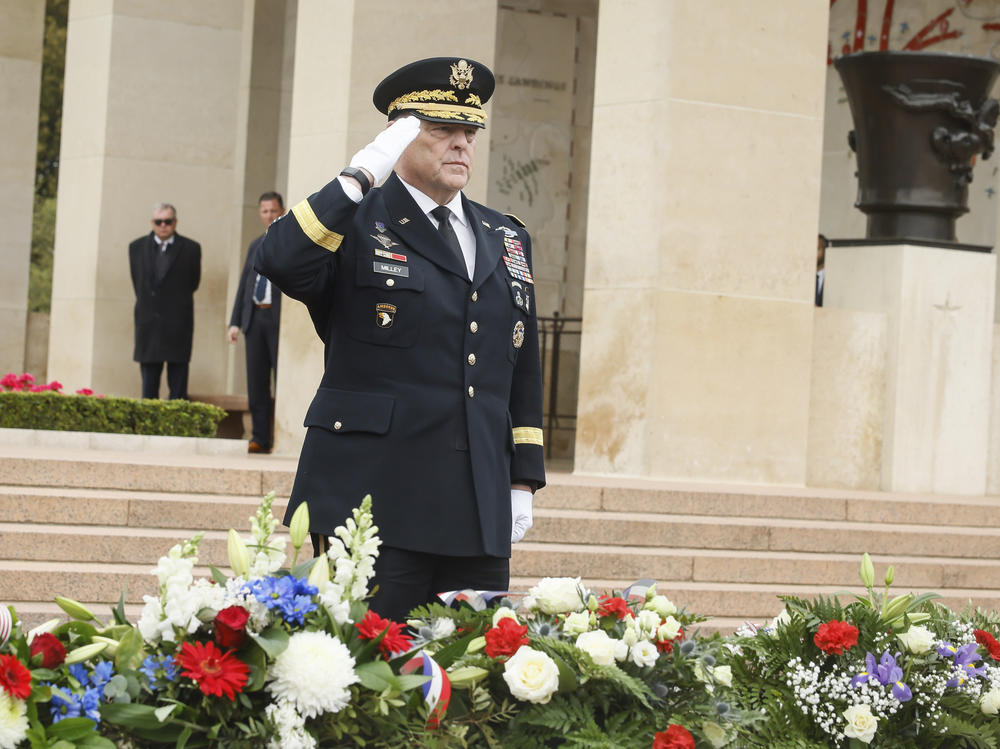 U.S Joint Chiefs of Staff Chairman Gen. Mark Milley salutes during a D-Day anniversary ceremony at the American Cemetery in Colleville-sur-Mer, Normandy, France on Tuesday.