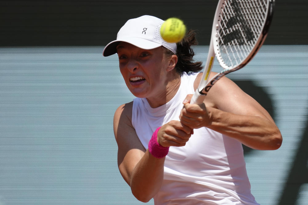 Poland's Iga Swiatek plays a shot against Coco Gauff of the U.S. during their quarterfinal match of the French Open tennis tournament at the Roland Garros stadium in Paris, Wednesday, June 7, 2023.