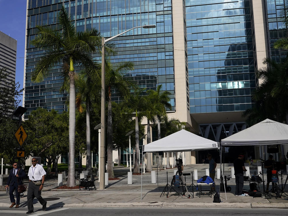 News media are set up outside of the Wilkie D. Ferguson Jr. U.S. Courthouse where a grand jury is meeting on Wednesday in Miami.